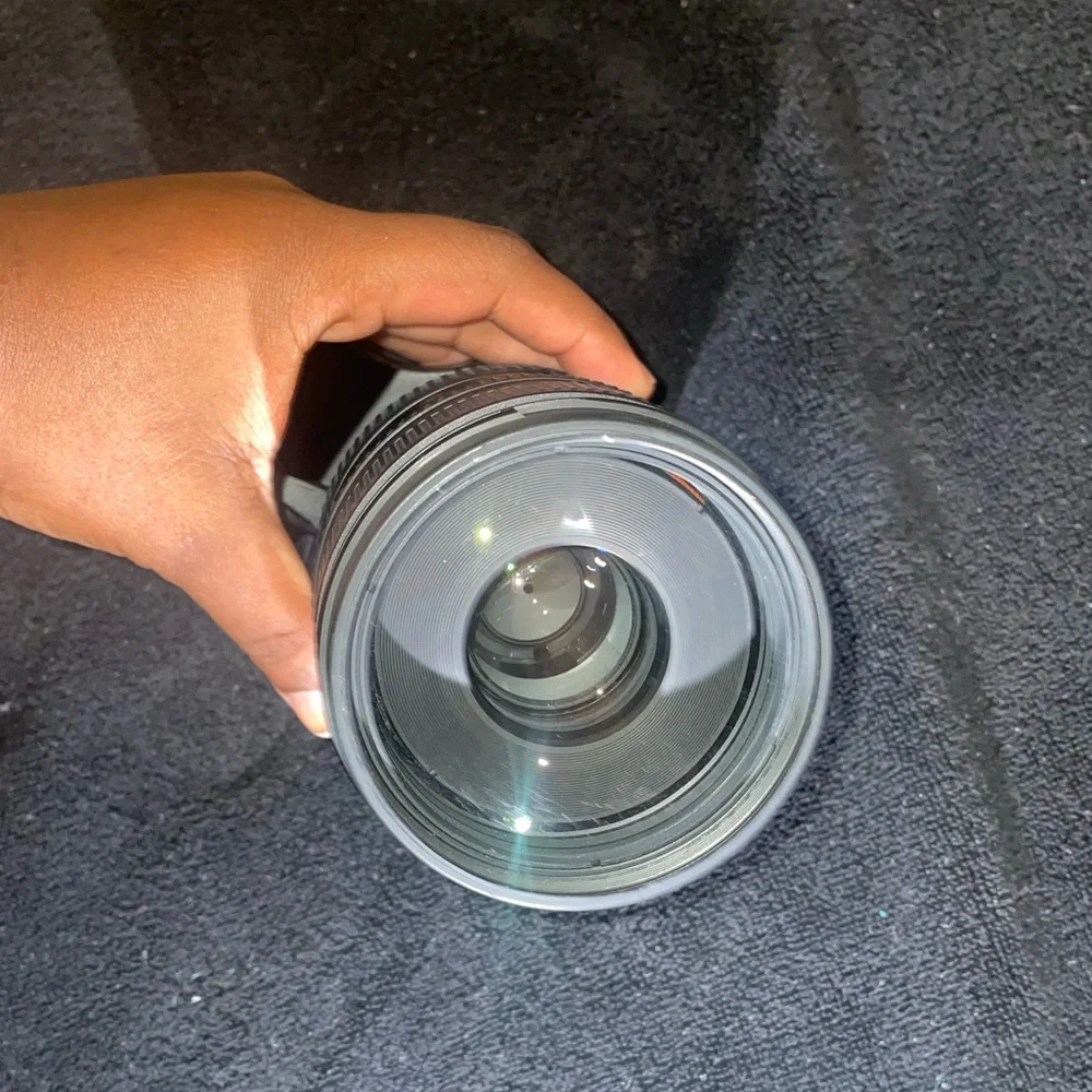 Telephoto lens I literally never use. Still clean and work very well.